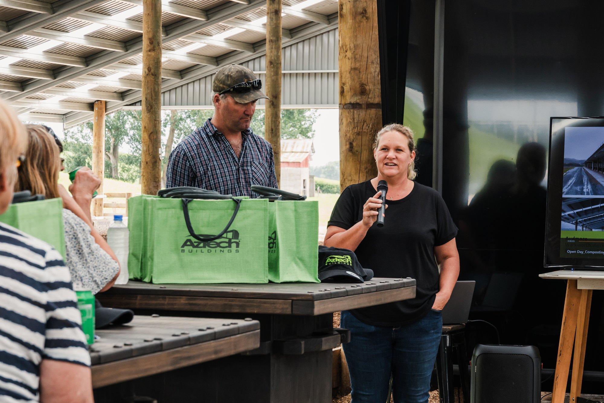 speaker addressing attendees at a composting barn roadshow event speaker addressing attendees at a composting barn roadshow event